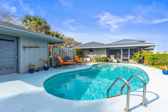 view of pool featuring a patio area