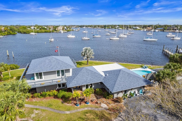 bird's eye view with a water view