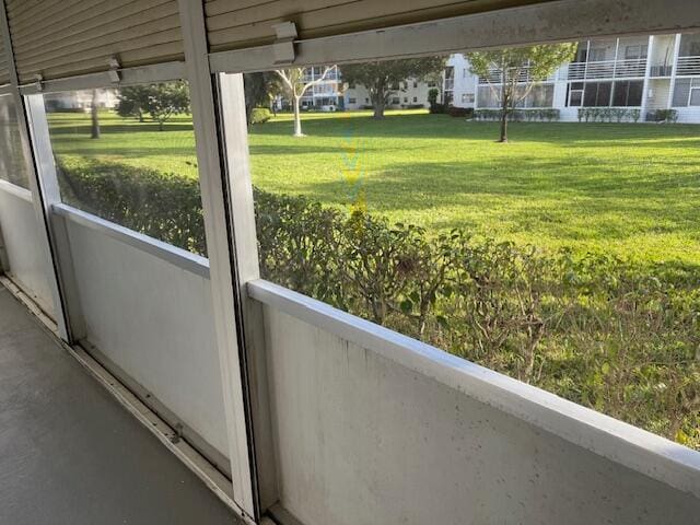 view of yard featuring a balcony