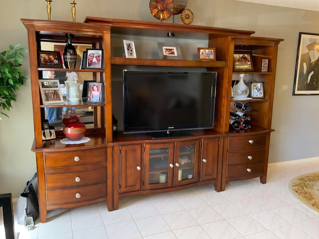 living room featuring light tile floors