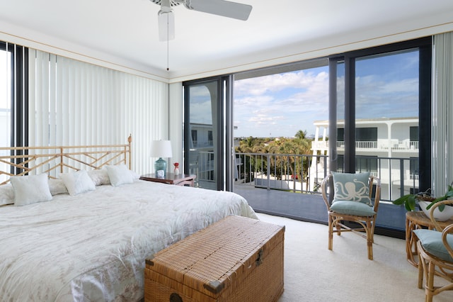 bedroom featuring light carpet, access to outside, and ceiling fan