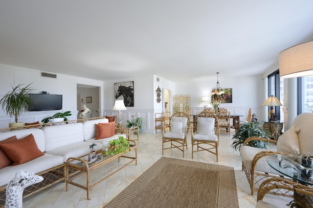 living room featuring light tile floors