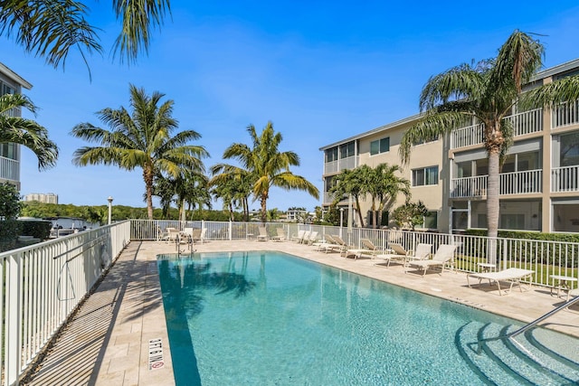 view of swimming pool with a patio