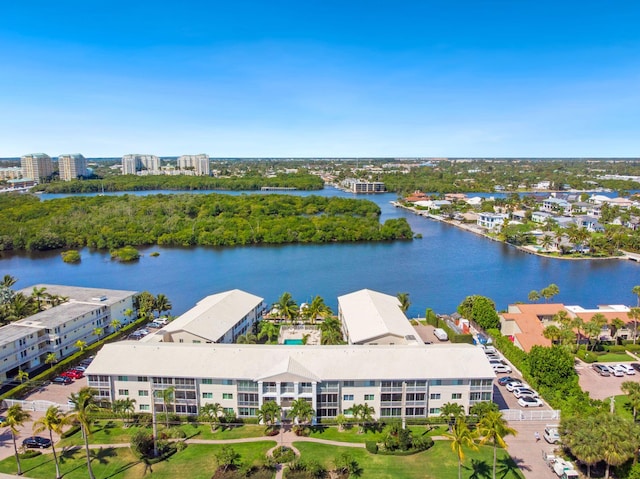 birds eye view of property featuring a water view