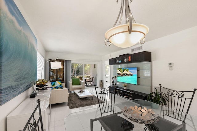 living room with light tile patterned floors