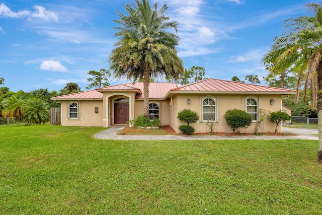 17891 N 86th St N, The Acreage, FL 33470 - view of front of house featuring a standing seam roof, stucco siding, and metal roof