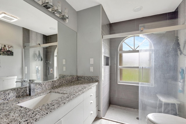 17891 N 86th St N, The Acreage, FL 33470 - bathroom with toilet, vanity, and a shower stall