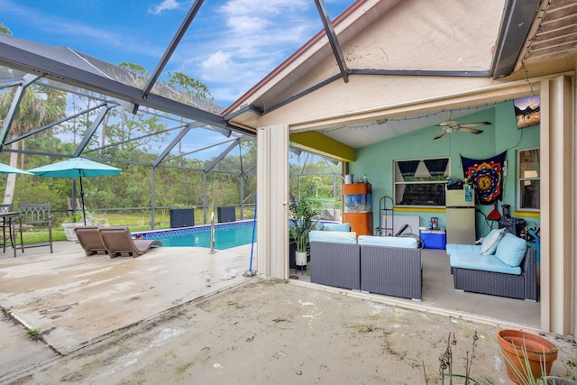 17891 N 86th St N, The Acreage, FL 33470 - view of patio / terrace featuring an outdoor hangout area, ceiling fan, an outdoor pool, and glass enclosure