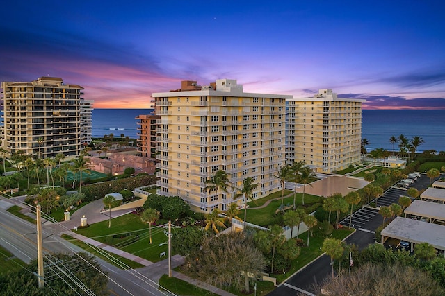 outdoor building at dusk with a water view