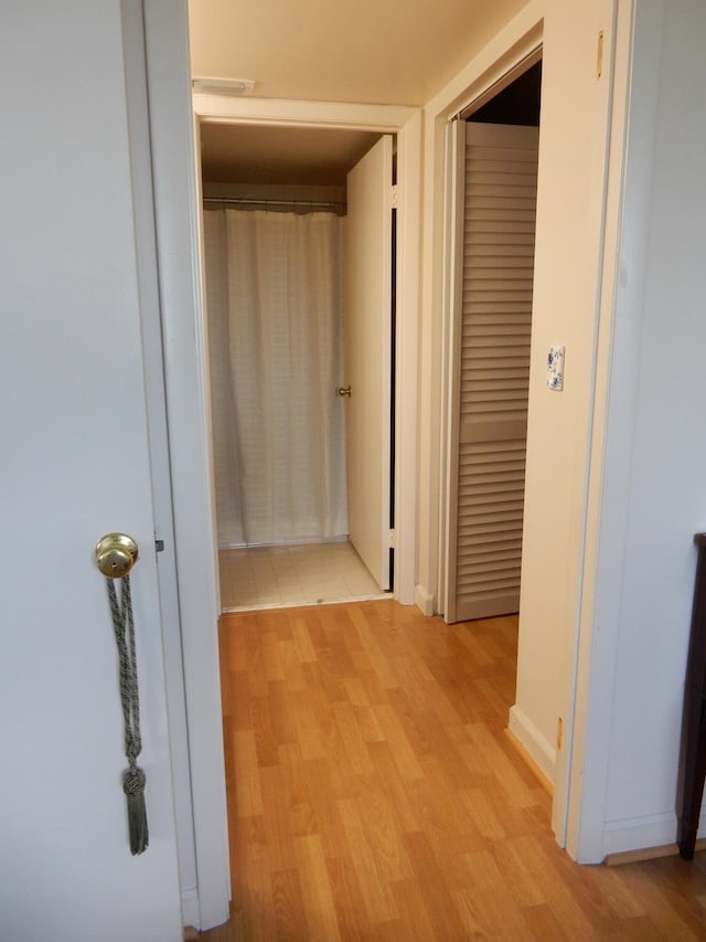 hall featuring light hardwood / wood-style flooring