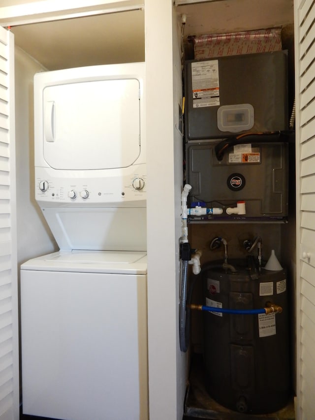 laundry area featuring stacked washer / dryer