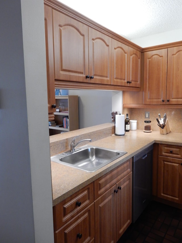 kitchen featuring sink and dishwasher