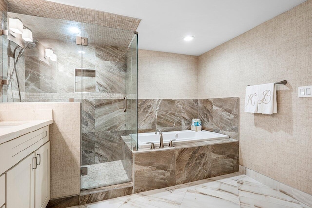 bathroom with tile floors, tile walls, plus walk in shower, and vanity