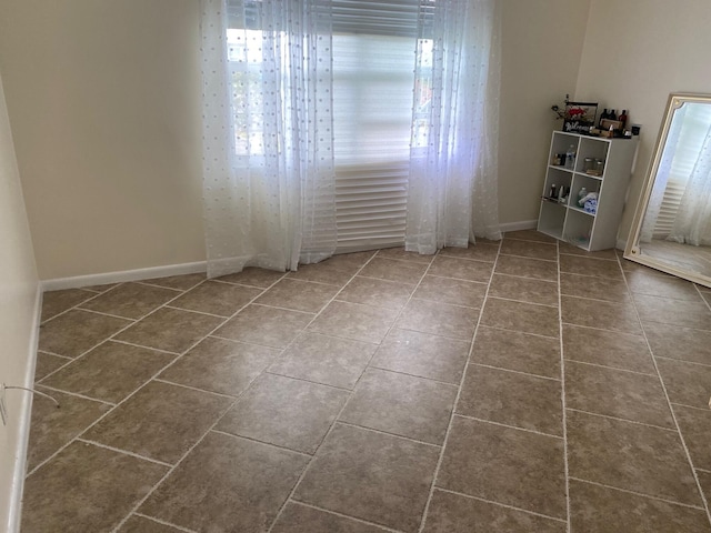 view of tiled spare room