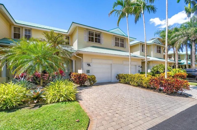 view of front of property with a garage