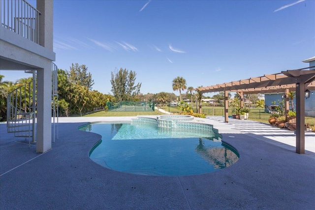 view of swimming pool with a pergola, an in ground hot tub, and a patio