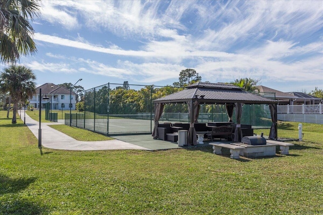 view of home's community with a gazebo and a yard