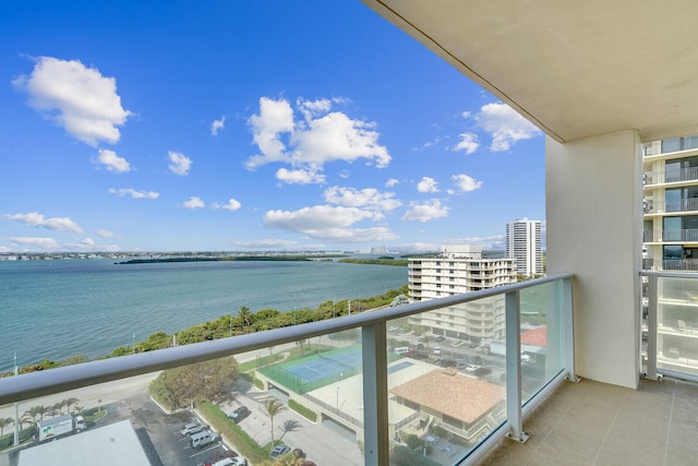 balcony featuring a water view