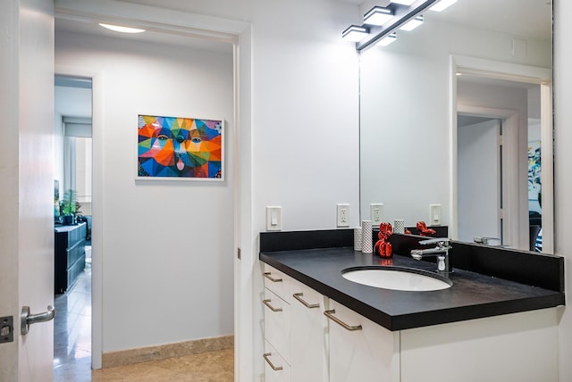 bathroom with vanity and tile patterned floors