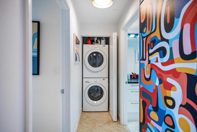 laundry room featuring stacked washer / dryer