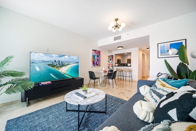 living room with a notable chandelier