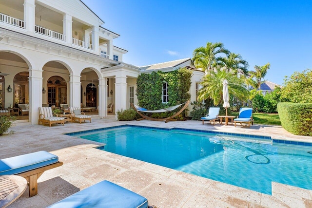 view of pool with a patio