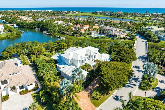 drone / aerial view with a water view