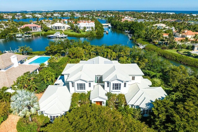 birds eye view of property featuring a water view