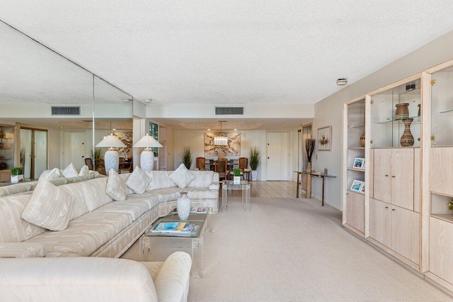 living room with a textured ceiling