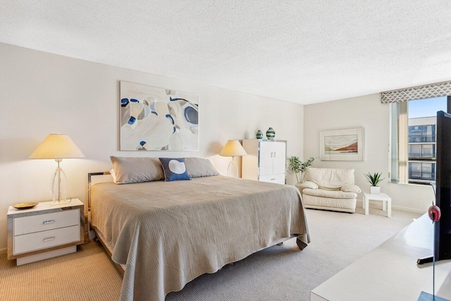 carpeted bedroom with a textured ceiling