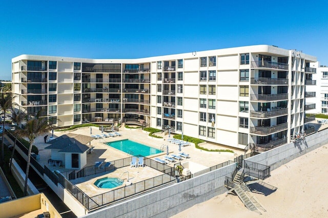 view of swimming pool featuring a patio area