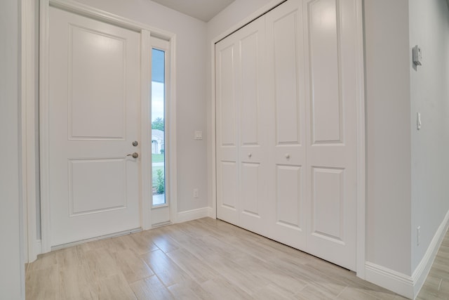 entrance foyer featuring light wood-type flooring