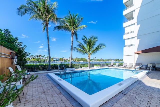 view of pool featuring a patio area