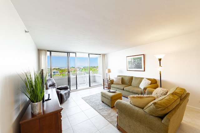 living room with light tile flooring and expansive windows