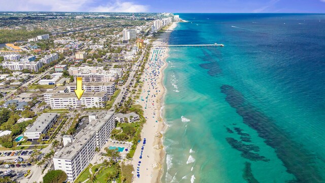 aerial view featuring a beach view and a water view