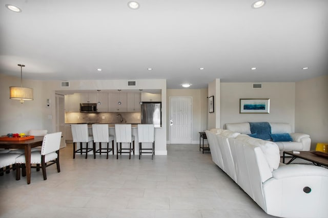 living room with sink