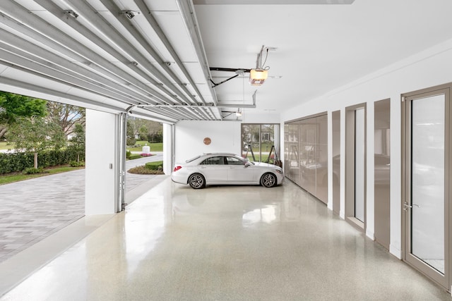 garage featuring a garage door opener