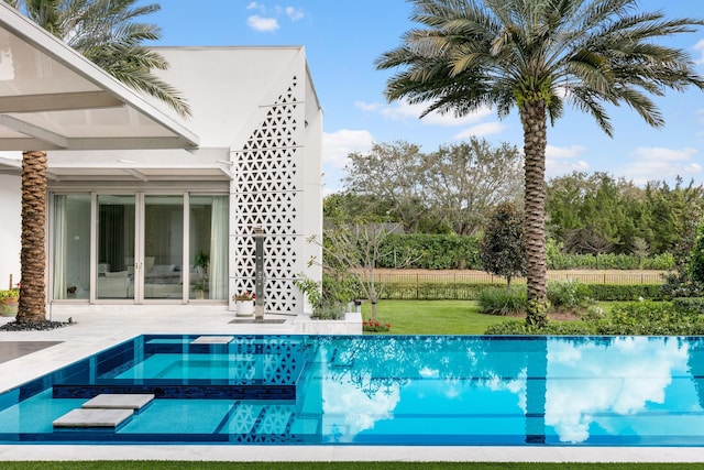 view of pool featuring a hot tub and a patio area