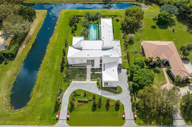 drone / aerial view with a water view