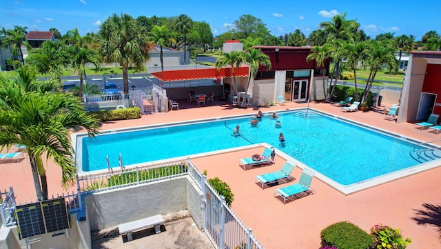 view of swimming pool featuring a patio