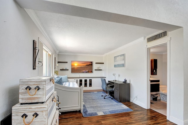 office space featuring dark hardwood / wood-style floors, ornamental molding, and a textured ceiling