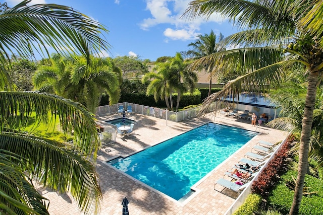 view of swimming pool with a patio area