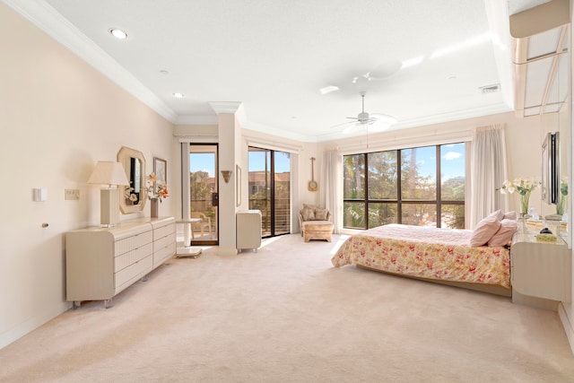 carpeted bedroom with multiple windows, ceiling fan, and crown molding