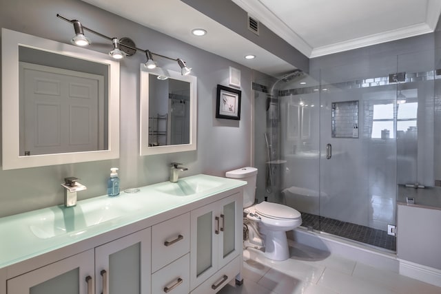 bathroom featuring toilet, a shower with shower door, double sink vanity, crown molding, and tile flooring