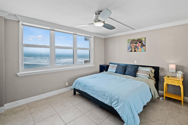 bedroom featuring a water view, ceiling fan, light tile flooring, and ornamental molding