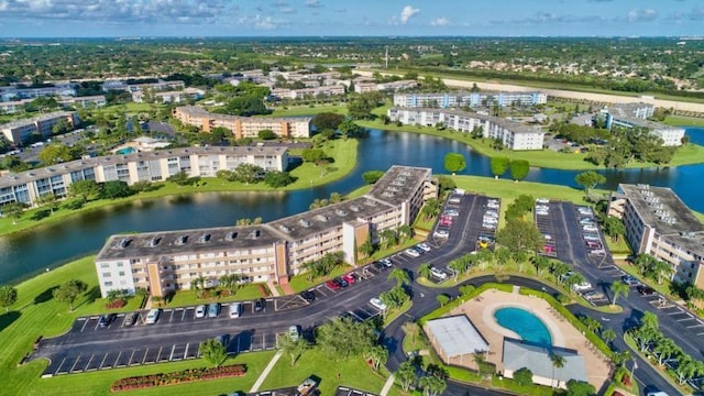 drone / aerial view with a water view