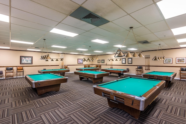 playroom featuring a paneled ceiling, pool table, and dark colored carpet