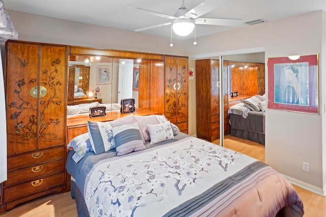 bedroom featuring ceiling fan and light wood-type flooring