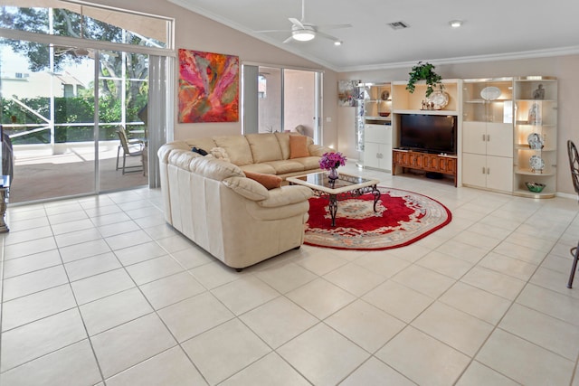 tiled living room with ceiling fan, lofted ceiling, and ornamental molding