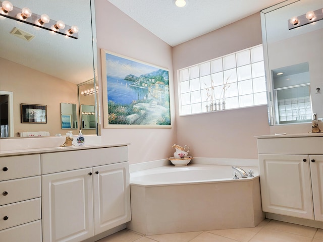 bathroom with tile patterned flooring, a textured ceiling, independent shower and bath, and vaulted ceiling